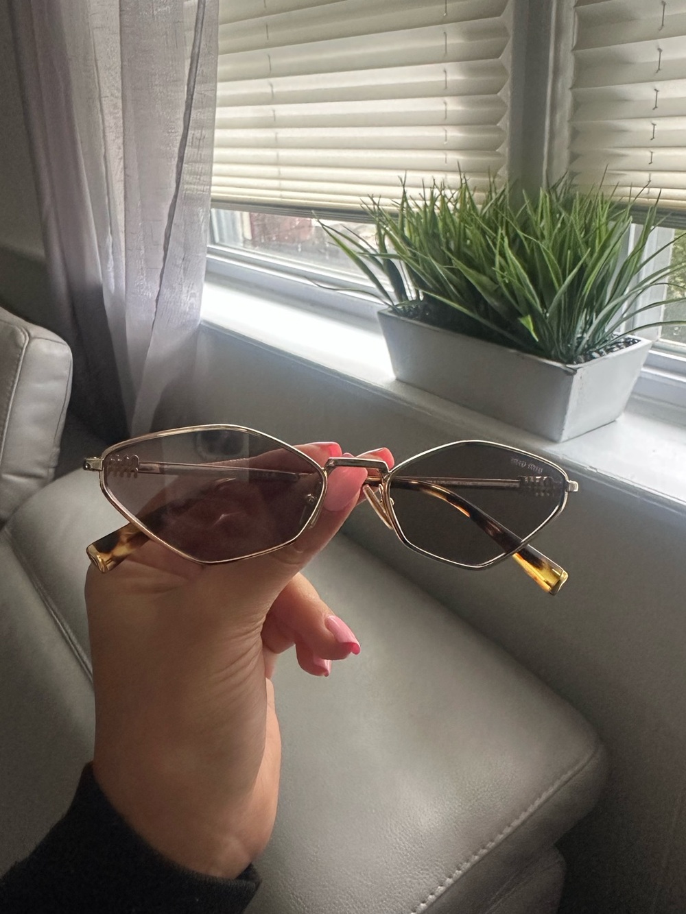 Miu Miu Gold Frame Sunglasses with Pink Lenses
